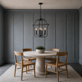 In a room | Royal Ebony 4-light chandelier above a limestone breakfast table