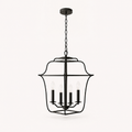 Front | studio view of Royal Ebony open lantern chandelier with four candle sockets
