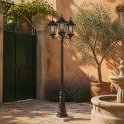 In a room | marnau Tavihan 3-Light Lamp Post beside a Mediterranean courtyard gate