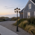 In a room | marnau Tavihan 3-Light Lamp Post at a coastal cottage drive at dawn
