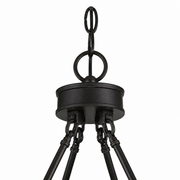 Close view | round canopy, chain links, and brace hardware on the chandelier