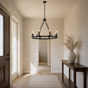 In an entryway | dark Classic Bronze 8-light wagon-wheel chandelier above the walkway