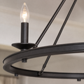 Close view | dark Classic Bronze steel ring rail, candle sleeve, bobeche, and clear flame-tip bulb