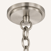 Hardware | close view of brushed nickel chain, connector ring, and round ceiling canopy