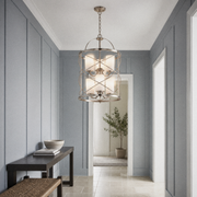In a room | marnau Tibidy 6-Light Lantern Chandelier in a blue-gray foyer