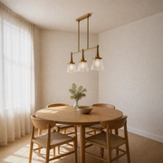Angle | the same three-light pendant from three quarters in the dining room
