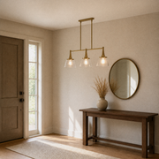 Entryway | the same pendant hanging over a console table and round mirror