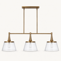 Front | studio front of the brass bar, two rods, and three seeded-glass cone shades