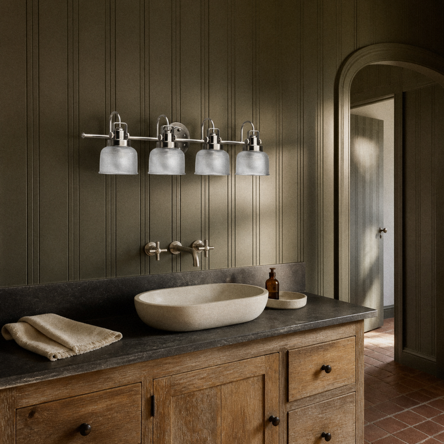 In a room | olive beadboard bathroom with antique-nickel 4-light vanity above a weathered-oak vanity
