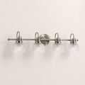 Studio | right three-quarter studio view of antique-nickel vanity, circular backplate, and four glass shades