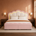 Clay room | Bedroom view of the pink-and-beige bed with flower-shaped headboard, bedding, and warm decor