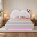 Room view | White upholstered bed with a cloud-shaped illuminated back and rabbit-ear accents styled in a bright bedroom.