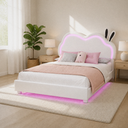 Corner | Angled bedroom view showing the low frame profile, bright upholstery, and LED glow near the floor.