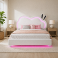 Room view | White bed styled in a bright bedroom, viewed from the foot with the illuminated back as focal point.