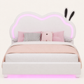 Detail | Close view of the cloud-shaped upholstered back and rabbit-ear accents with the LED outline glowing.