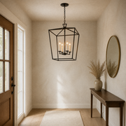 Entryway | the lantern chandelier hanging in a foyer beside a console table