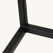 Detail | close view of the matte black cage bar finish and corner joint