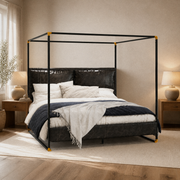 Angle | Three-quarter bedroom view showing the canopy depth, open sides, and upholstered headboard