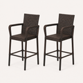 Studio | three-quarter studio view of two dark brown woven wicker bar stools showing the seat depth and arm curves