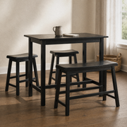 Third room | the same table, stools and bench in a warm plaster dining room, golden afternoon light