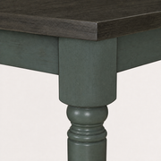 Detail | the table leg's turned profile and corner joinery
