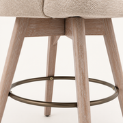 Detail | the wood leg joinery and the bronze footrest ring