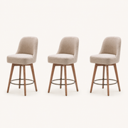 Studio | all three stools at a true three-quarter studio angle, rounded backs and tapered leg profile both reading