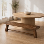 In a room | a second angle in the oak dining room, the bench's long side and stretcher reading in full