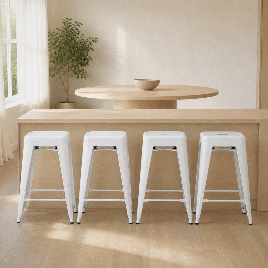 In a room | all four matching stools at a warm oak dining room's island edge, soft morning sidelight from the left