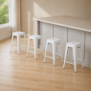 In a room | all four matching stools shown together, the complete set of four sold with this listing