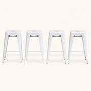 Front | all four matching stools centered on paper, gray finish and the X-brace visible