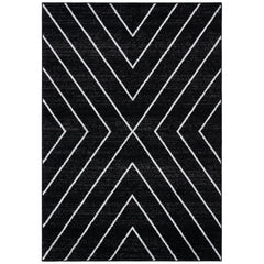 Full rug | the whole rug flat on a plain backdrop, no furniture