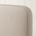 Texture | Close view of the beige woven upholstery and piped welt