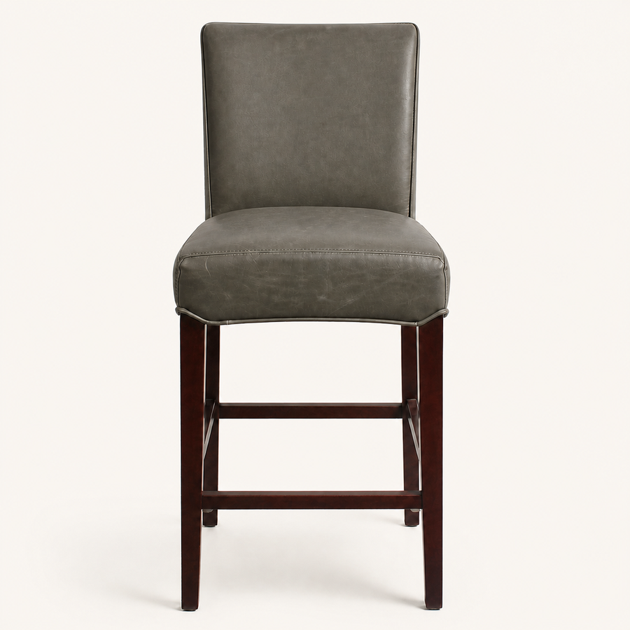 Front | vintage gray faux-leather counter stool centered on paper, four dark cherry-mahogany wood legs and footrest
