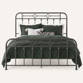 Metal detail | Close view of the headboard and footboard rails, spindles, and circular accents
