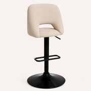 Angle | true three-quarter studio view, the round base plate foreshortened and the oval cutout reading with depth