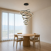 Scale | the full six-ring drop shown against the dining room's floor-to-ceiling window