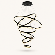 Front | studio front of all six black rings spiraling down from the canopy
