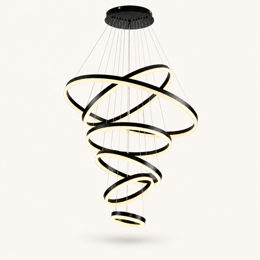 Front | studio front of all six black rings spiraling down from the canopy