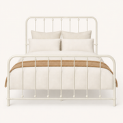 Front | Straight-on studio view of the complete off-white metal frame on a pale backdrop