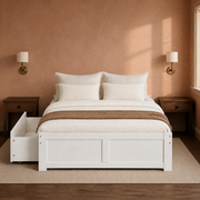 Clay room | White storage bed against a clay-toned wall with brass sconces