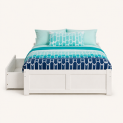 Detail | Close view of the white footboard panels, drawer edge, and mattress platform