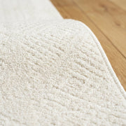 Pile close up | the raised pattern and bound edge up close