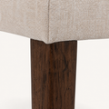 Detail | tapered leg where it meets the padded seat frame