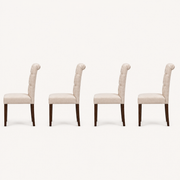 Side | profile view of the tapered legs and the rolled top edge, all four chairs identical