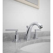 Installed | polished chrome widespread faucet mounted at a bathroom sink