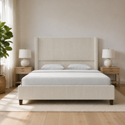 Room 2 | Front view in a bright white bedroom with oak nightstands and a fiddle leaf fig