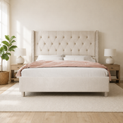Room 2 | Front view in a bright white bedroom with oak nightstands and a fiddle leaf fig