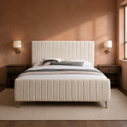 Room 3 | Front view in a clay plaster bedroom with brass sconces and a vintage rug