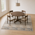Peris geometric rug beneath a dining set